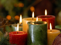 Warm Christmas holiday candles in home interior